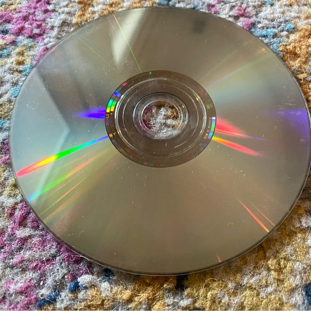 Blizzard Warcraft and Ubisoft Dark Messiah PC Game Discs